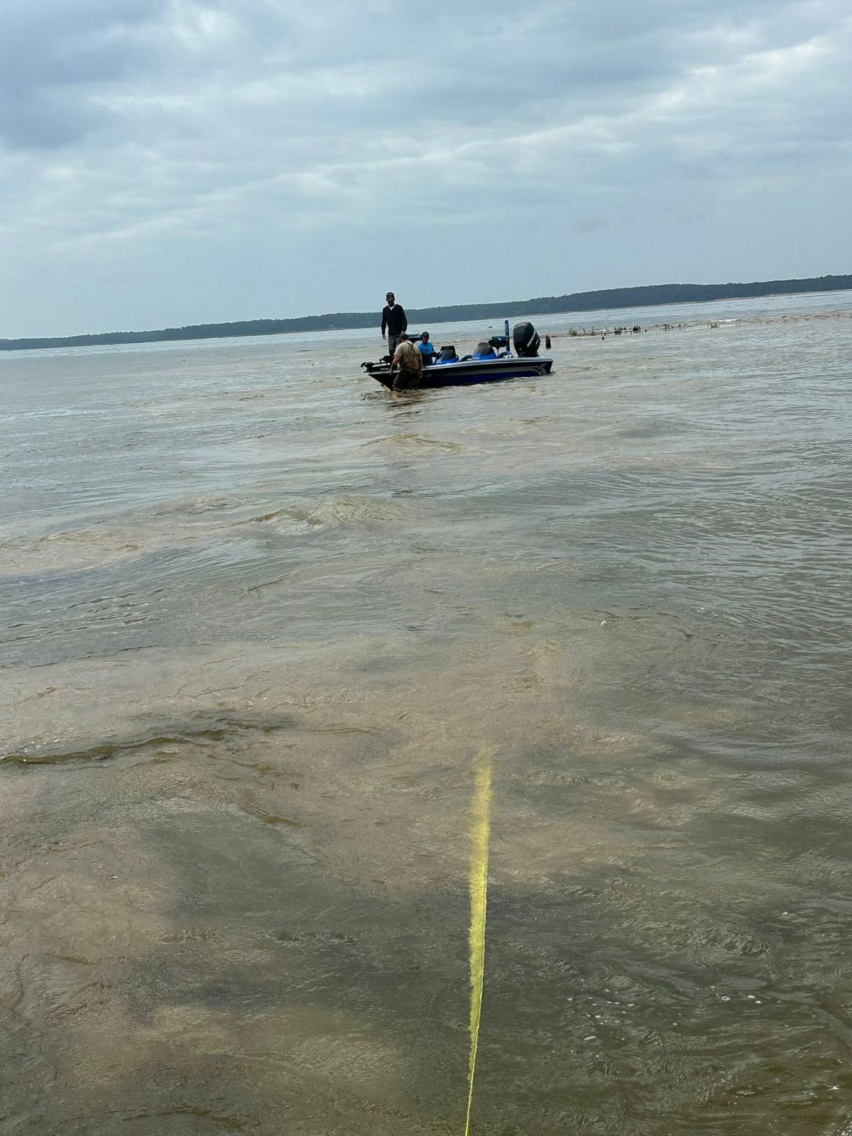A TowBoatUS service vessel working the calm water of Sam Rayburn Reservoir.